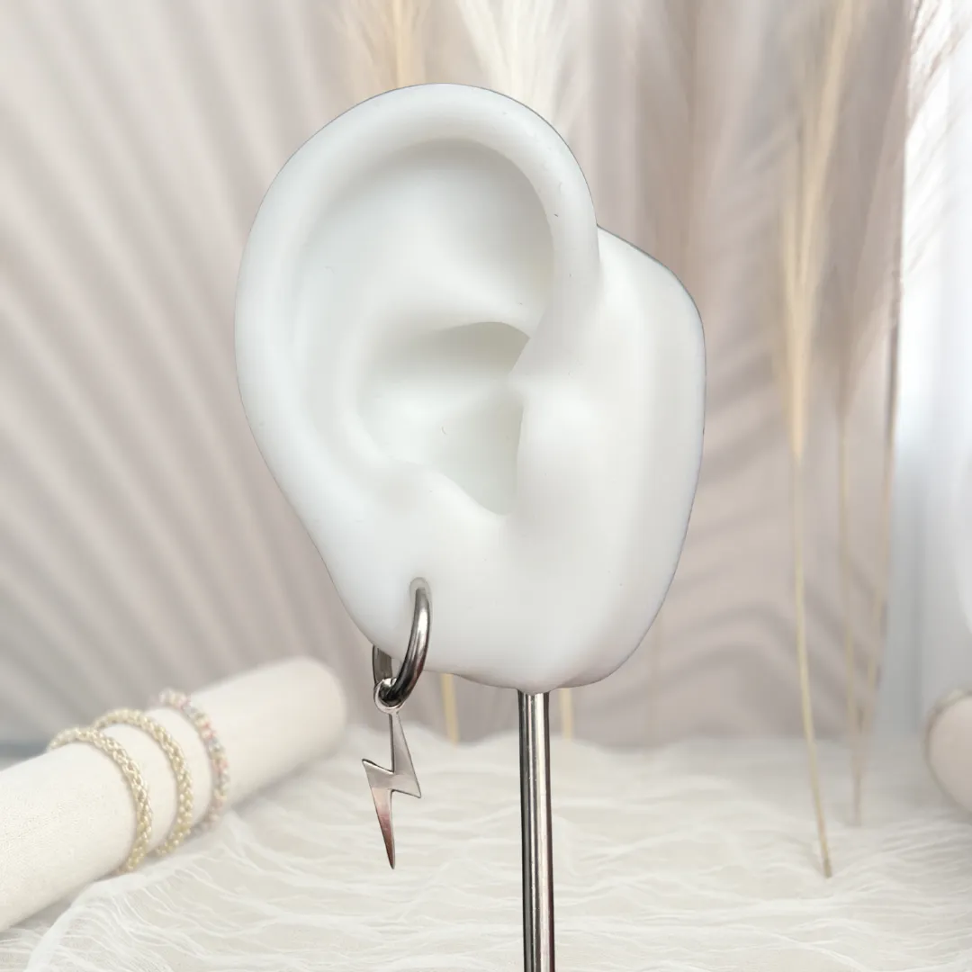 Aretes Rayo Plateados — YNDRA